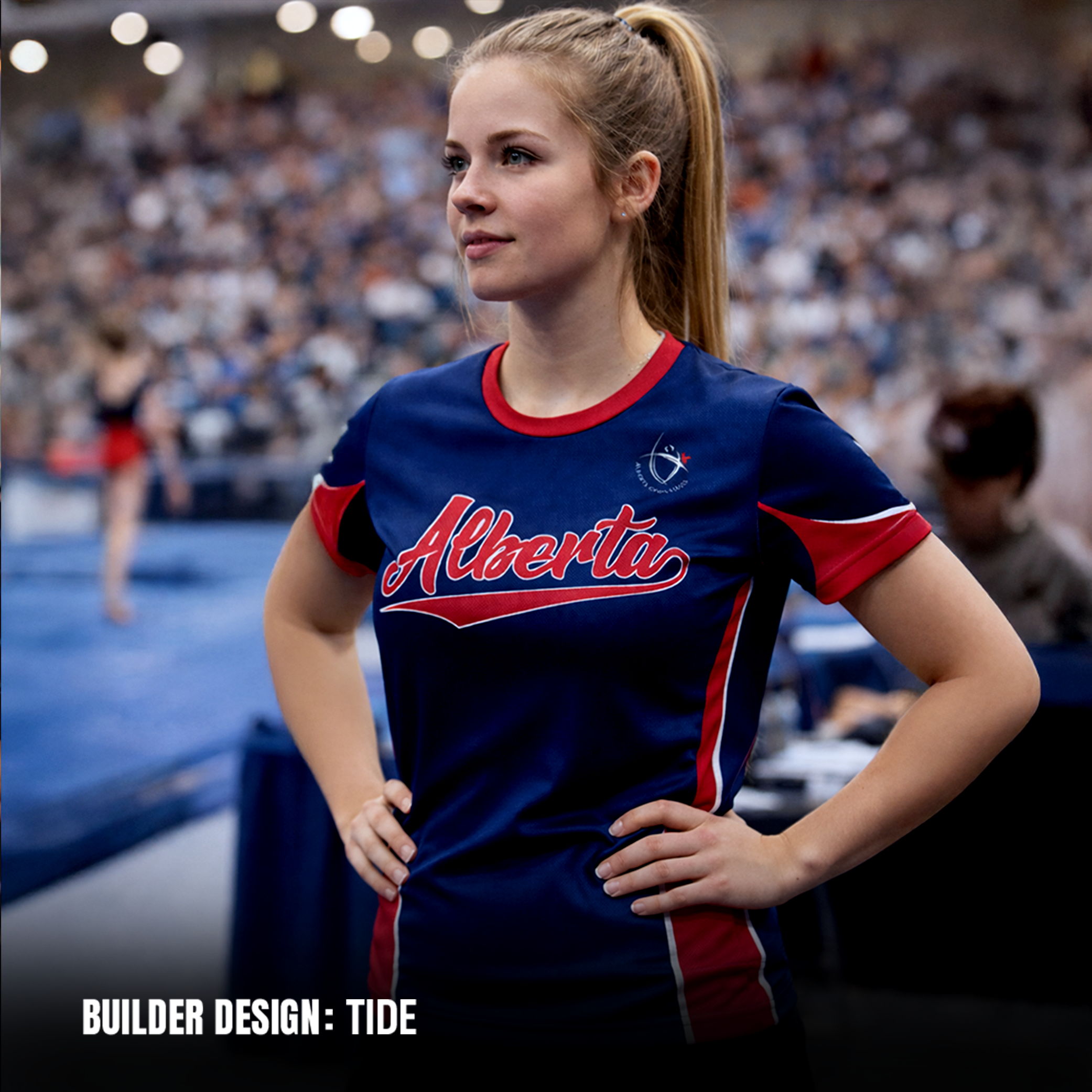Women wearing a blue and red sports jersey with 'Alberta' on it, standing in an indoor sports arena.