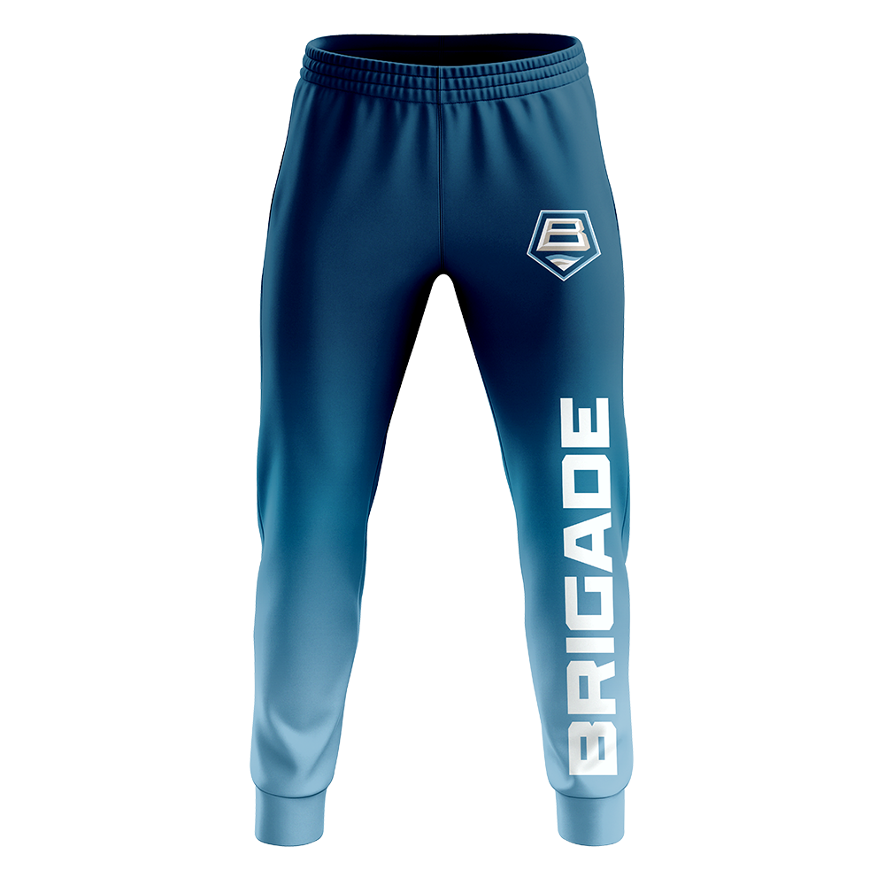 Blue jogger pants with 'BRIGADE' branding on a white background